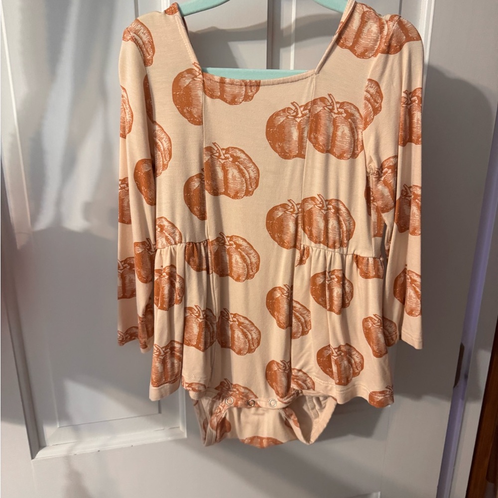 Kate Quinn Pumpkin Print Cream and Orange onesie